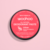 Woohoo natural deodorant paste in a black container with a pink label, 60g, featuring urban scent details.